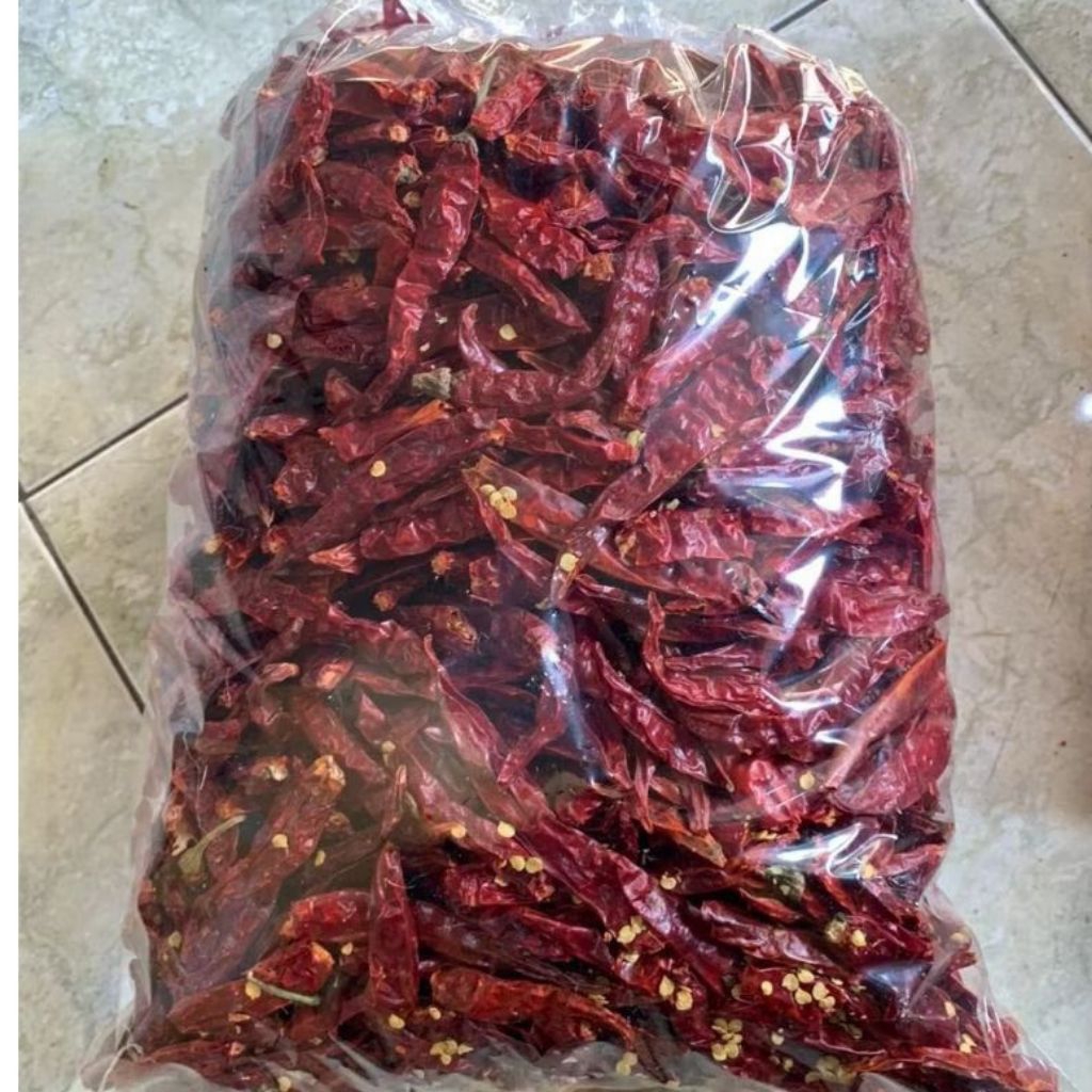 

cabe teja kering, cabe kering pedas, cabe dapur, bumbu dapur pedas, sambal cabe kering, bahan masakan pedas, cabe awet kering pedas /cabe pedas kering100gram