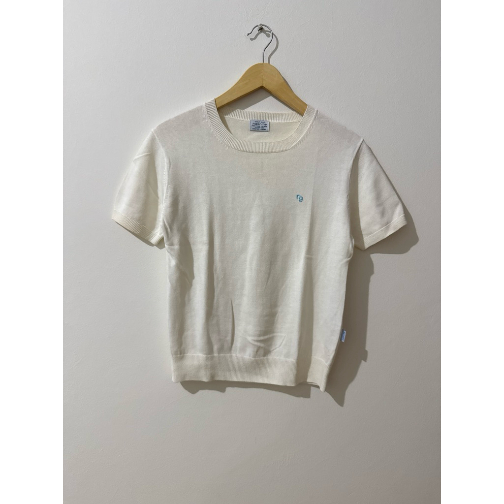 naknine broken white knit top