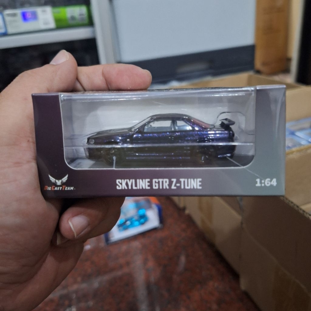 DCT Diecast Skala 64 Nissan Skyline R34 Purple Edition