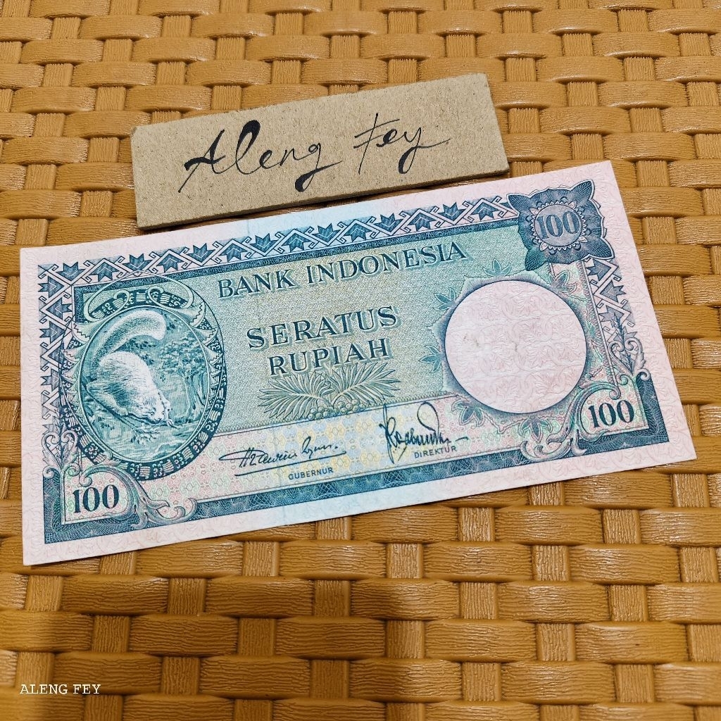 uang kuno 100 Rupiah tupai 1957