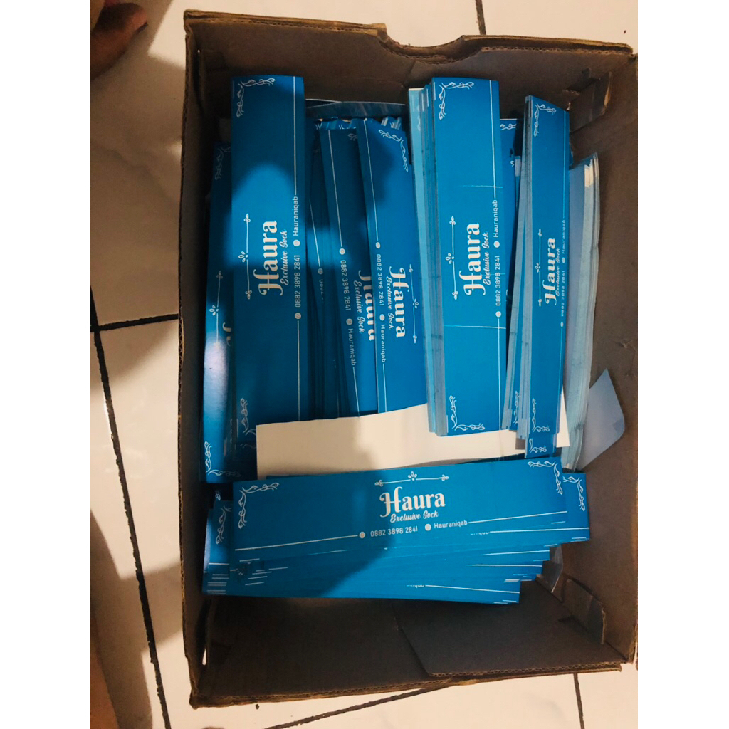 label kaos kaki (salah cetak)