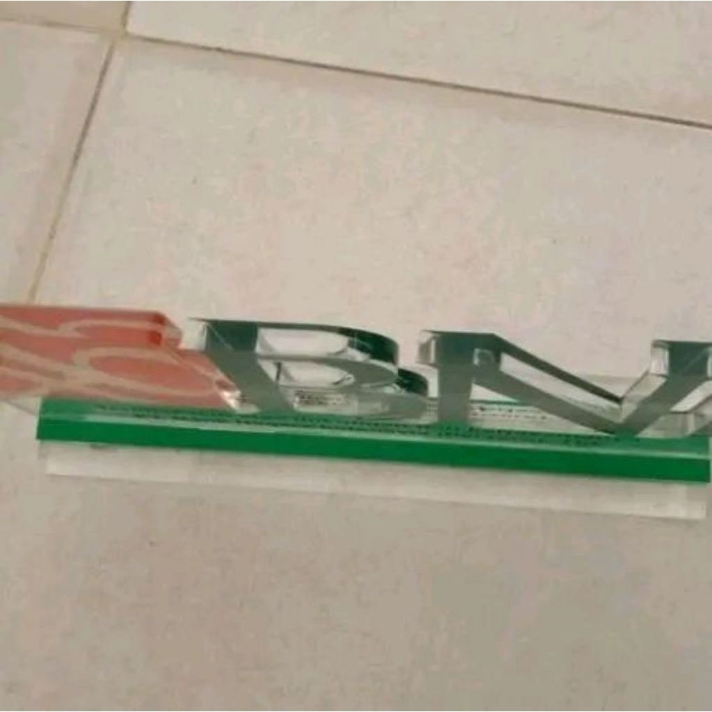 

Plakat/Bank/BNI/Akrilik/Panjang/30/Lebar/6/Tinggi/16