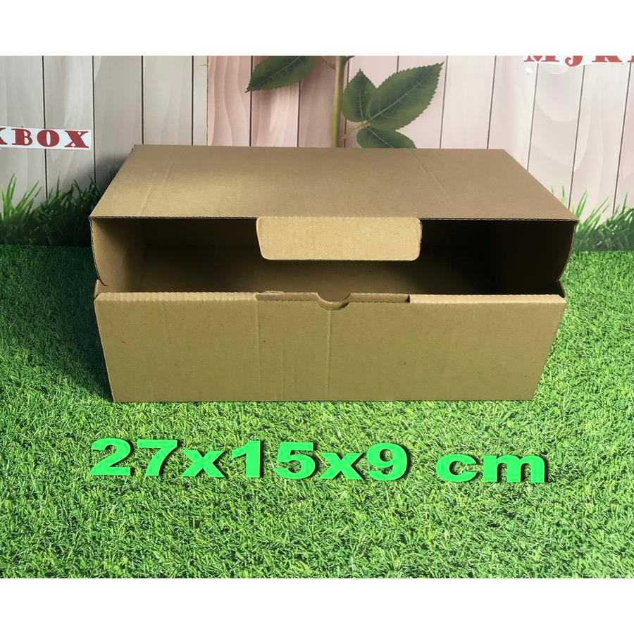 

Kotak Kardus karton Uk. 27x15x9cm.........Die Cut
