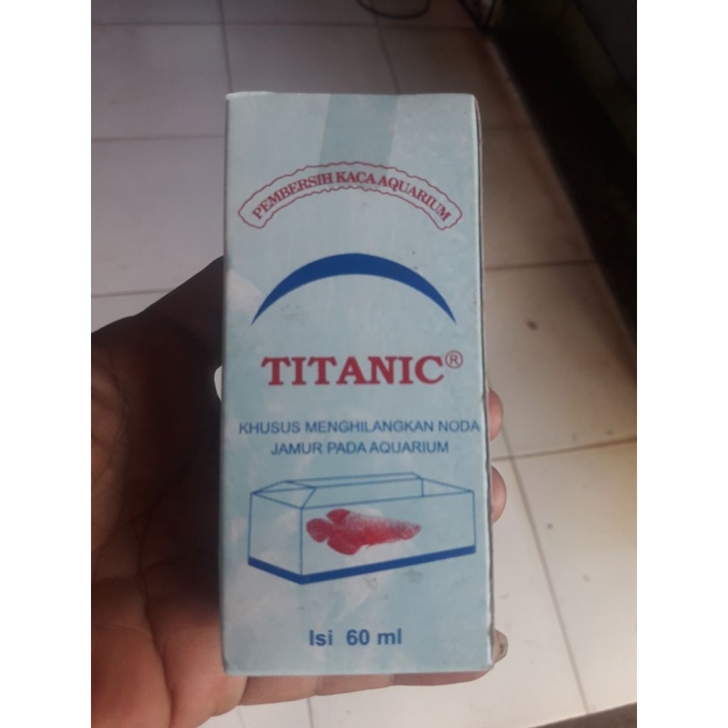 titanic pembersih kerak kaca aquarium