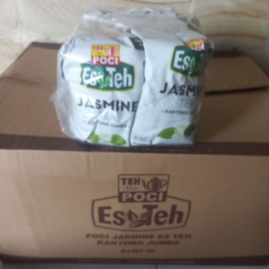 

lontong12 TEH POCI JASNE JUMBO CELUP 1 BOS isi bungkus ,0 %asli