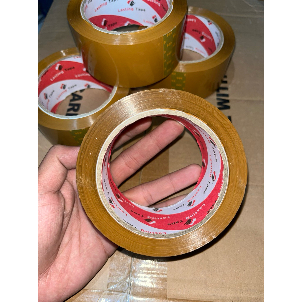 

LAKBAN 48mm x 90m coklat bening isolatip besar daya rekay kuat dan tebal