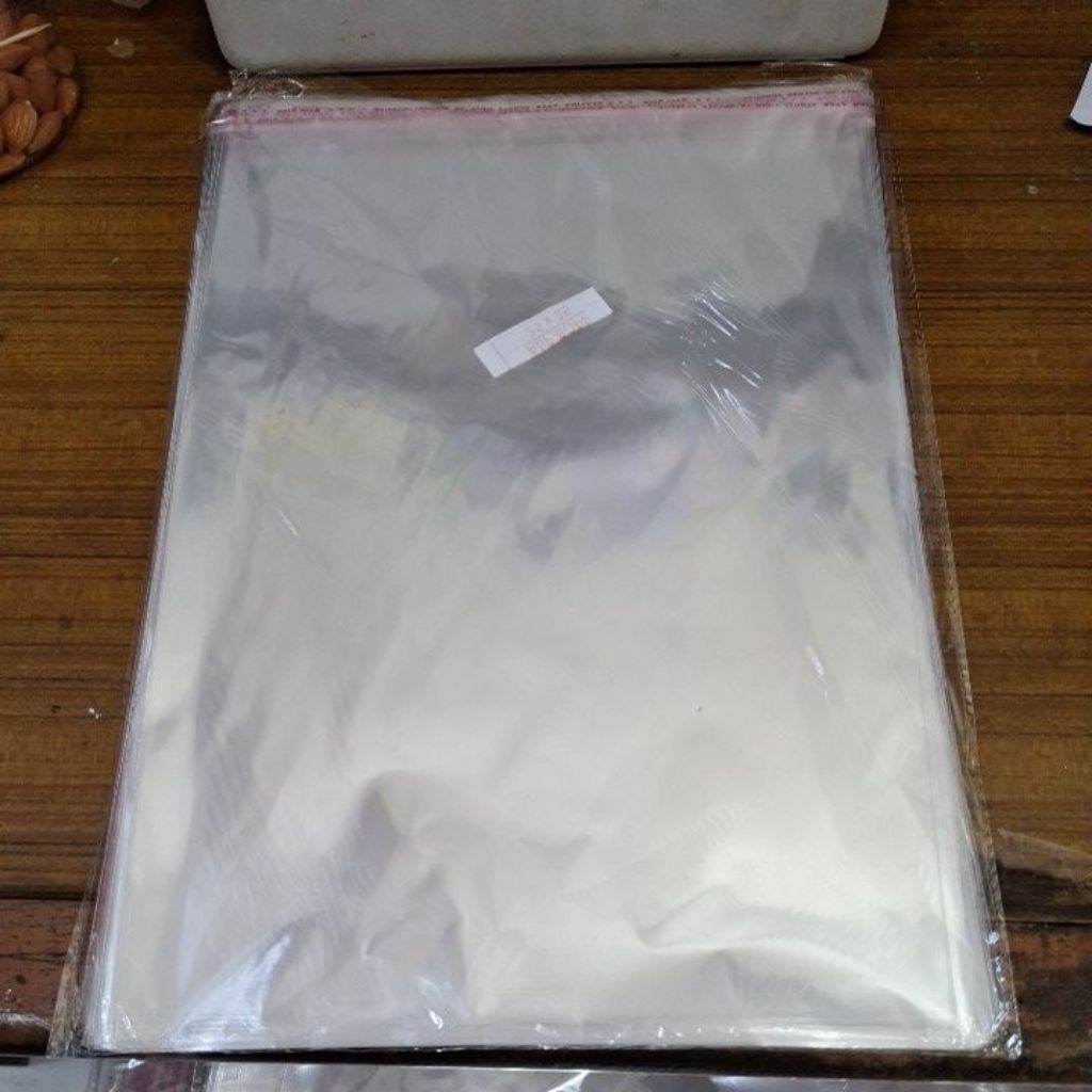 

plastik opp / plastik baju ukuran 25x30