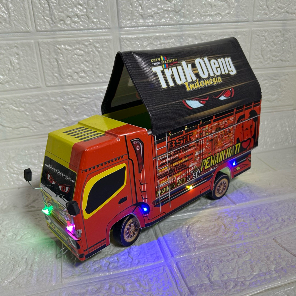 Mobil Mainan Truk Oleng Anti Gosip Full Lampu Dan Terpal