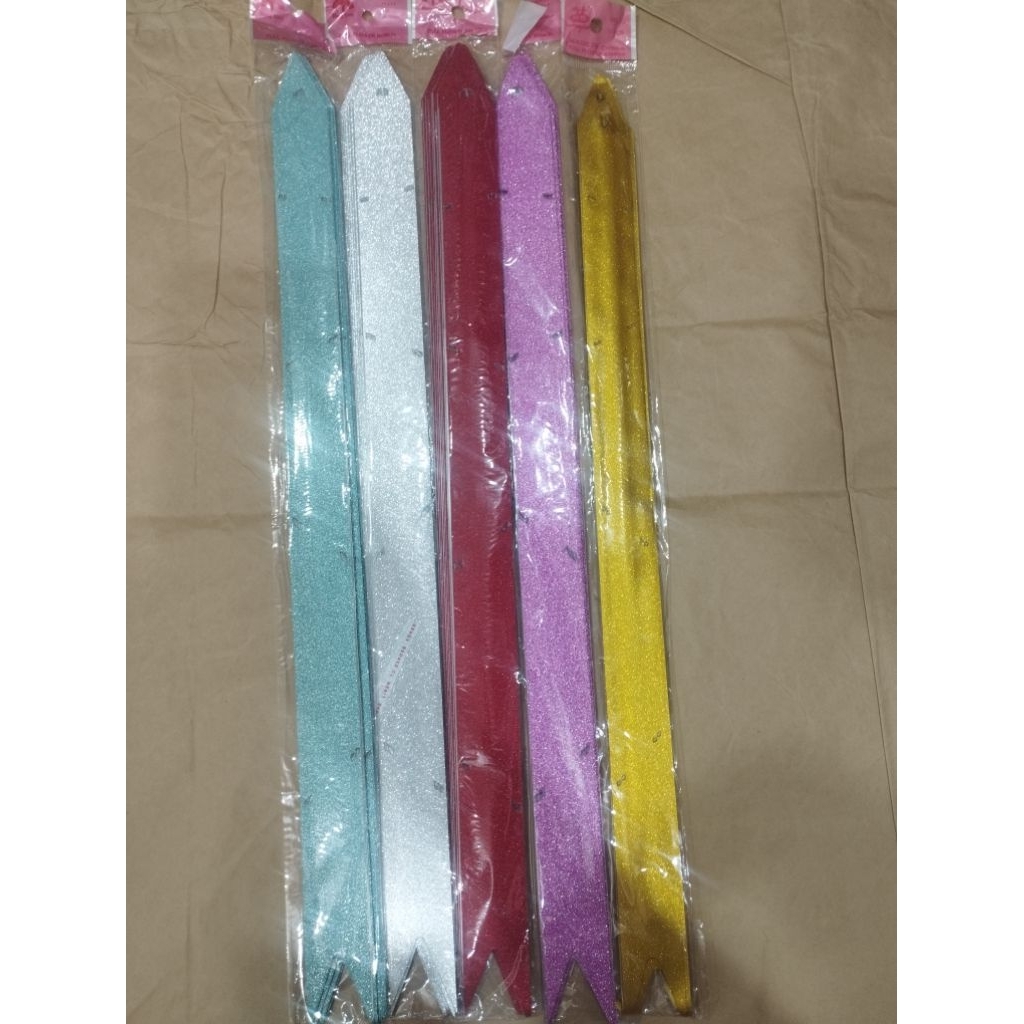 

pita tarik 30cm. pita tarik langsung jadi warna warni