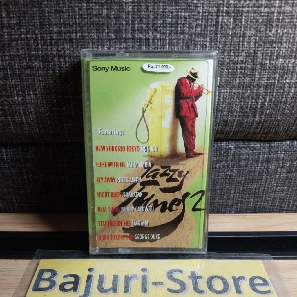 Kaset Pita Jazzy Tunes "Trio Rio" "Tania Maria" "Peter Allen" "Shakatak" "Bobby Caldwell" "Santana" 