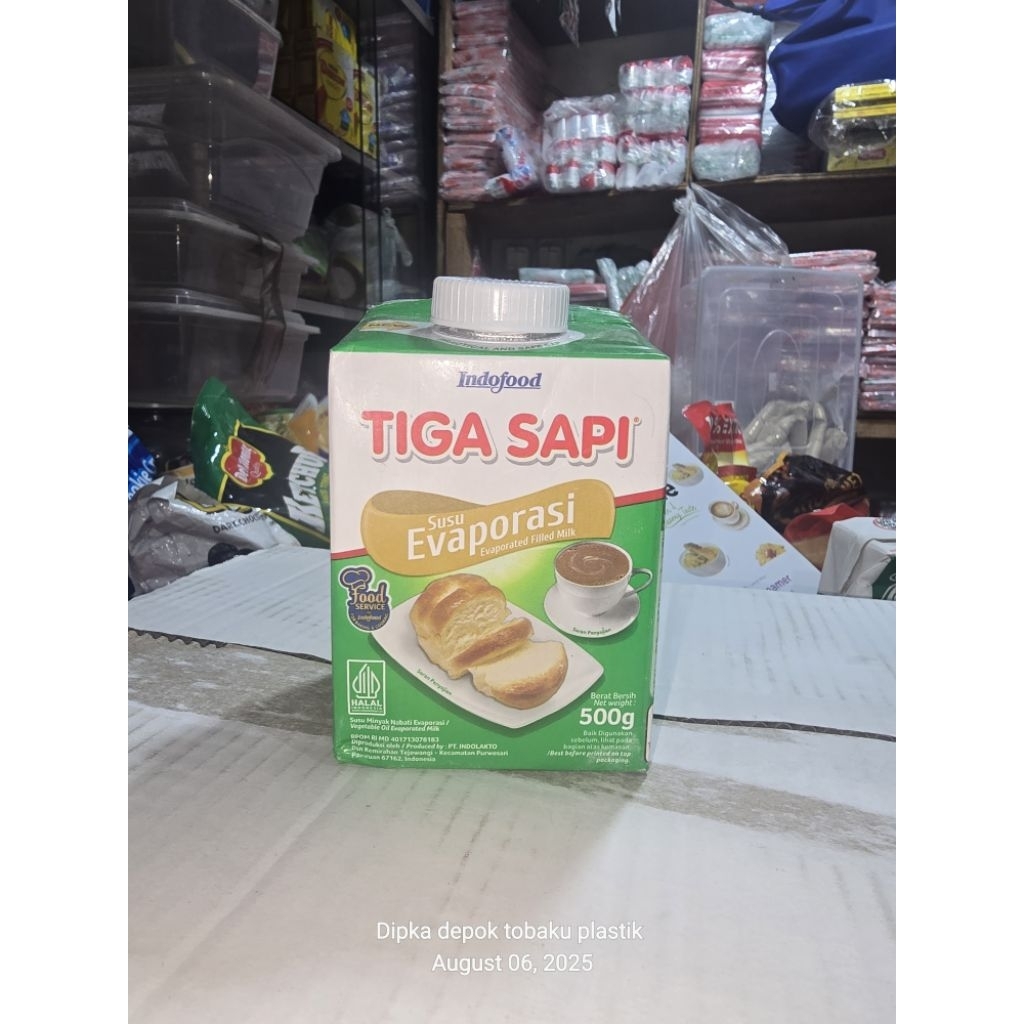 

susu evaporasi tiga sapi evaporated 500gram kotak ecer dan per karton 1 dus isi 12