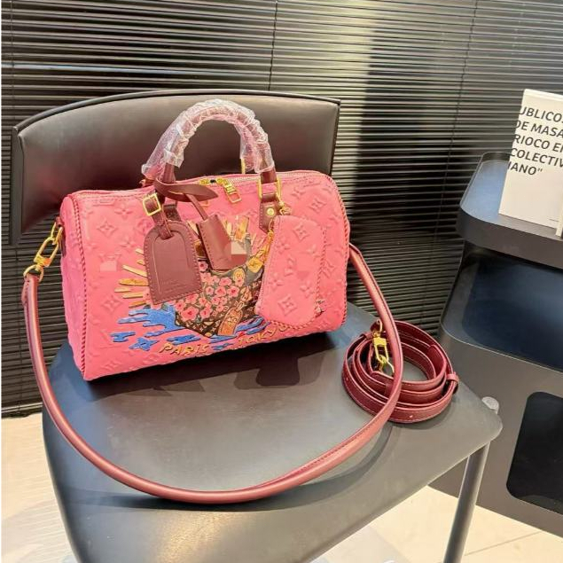 Pre Order tas nigo keepall model pillow bag berbentuk silinder dengan desain khas monogram canvas ik