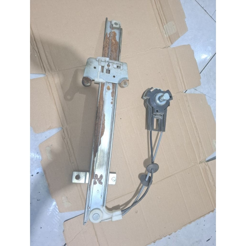 rel rell regulator kaca pintu depan kiri ford laser 1.3 86-97