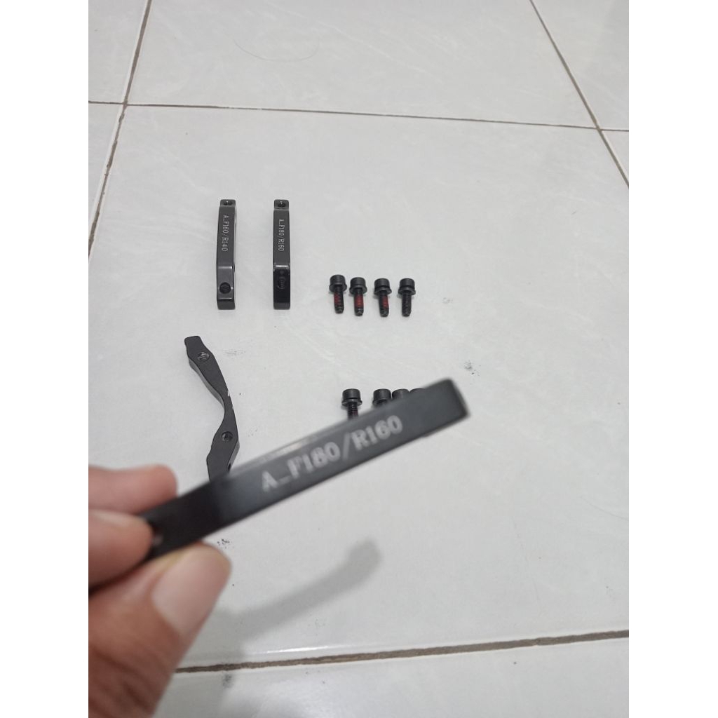 Adaptor Kaliper Cakram sepeda