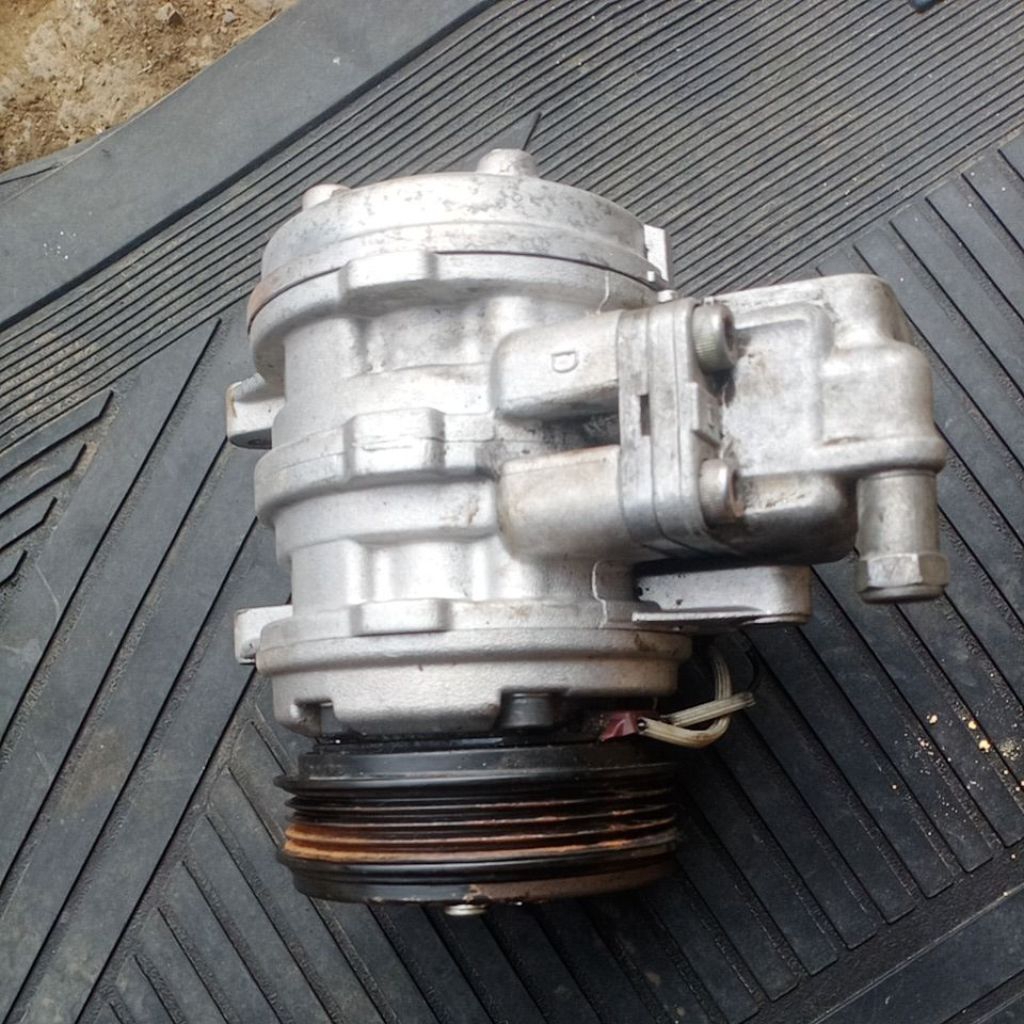 compresor ac suzuki baleno 2000
