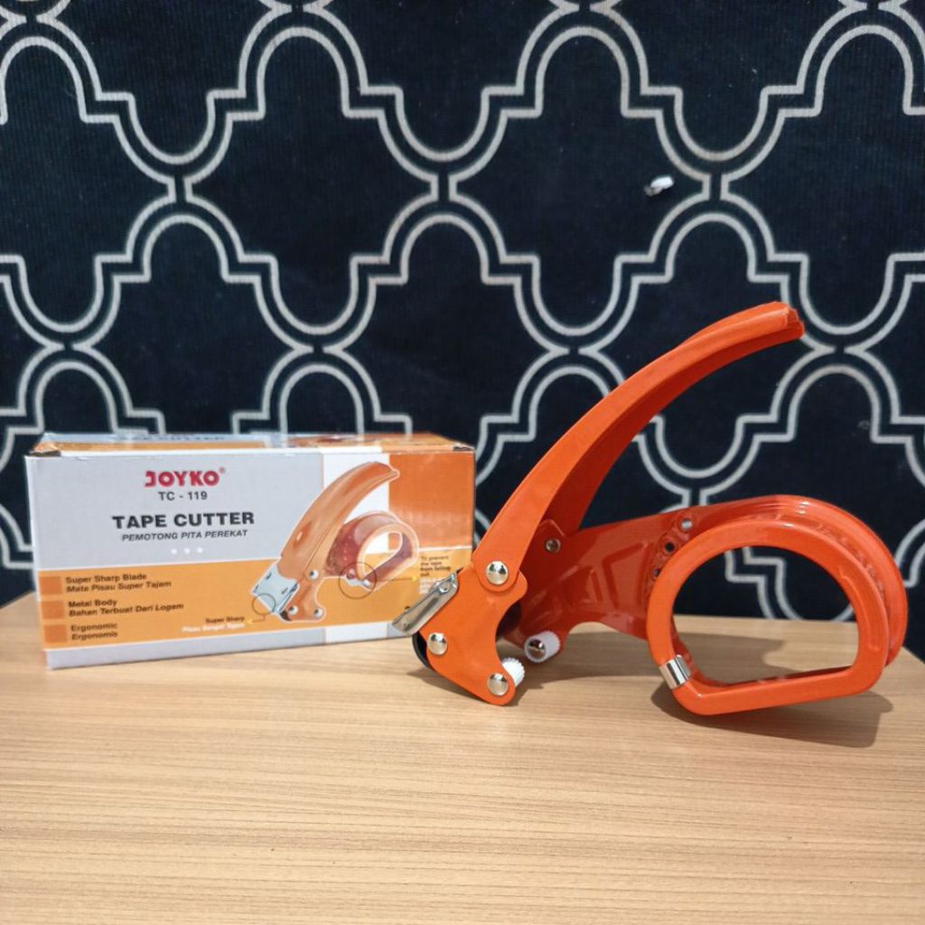 

TAPE CUTTER / TAPE DISPENSER/ PEMOTONG PITA PEREKAT MERK JOYKO TC - 119