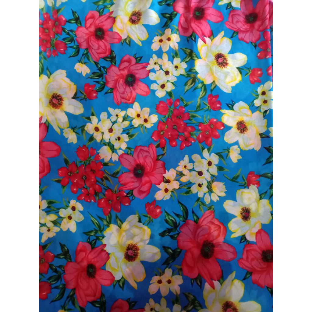 KAIN CERUTI KAIN CHIFFON TIPIS MOTIF BUNGA MERAH KUNING DASAR BIRU (180 cm = Rp42.000)
