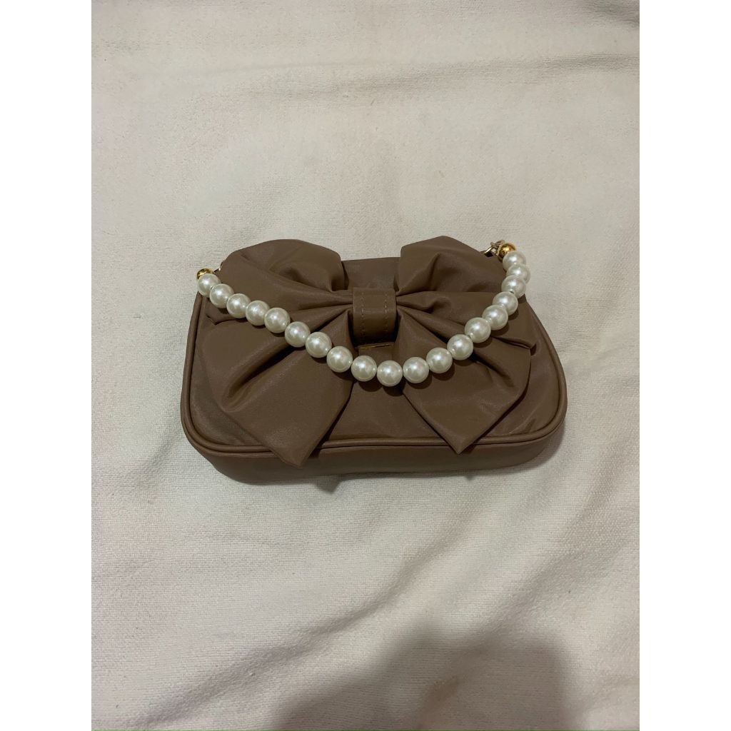 TAS UNTUK WANITA BERPERGIAN KEMANA SAJA