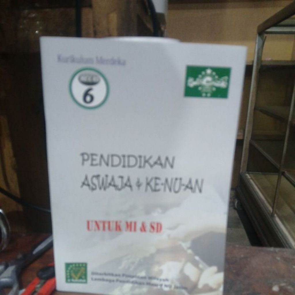 Buku pelajaran pendidikan Aswaja&ke- nu- an untuk mi/ sd kelas 6 kurikulum merdeka.