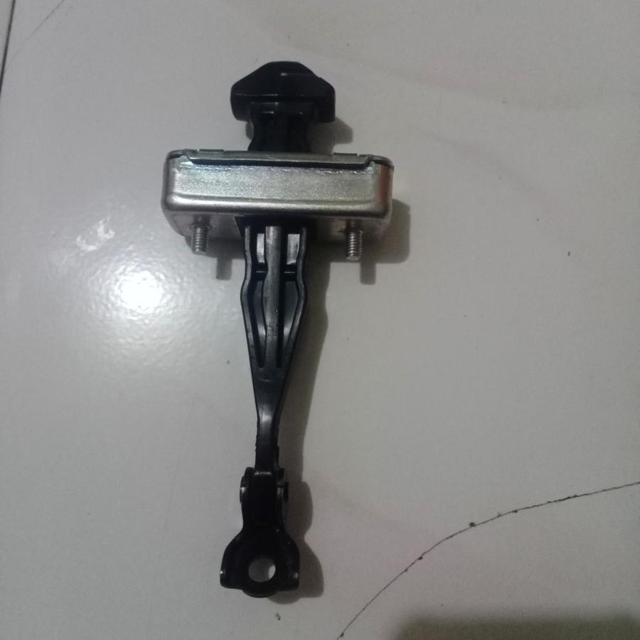 tahanan penahan pintu mobil mazda original