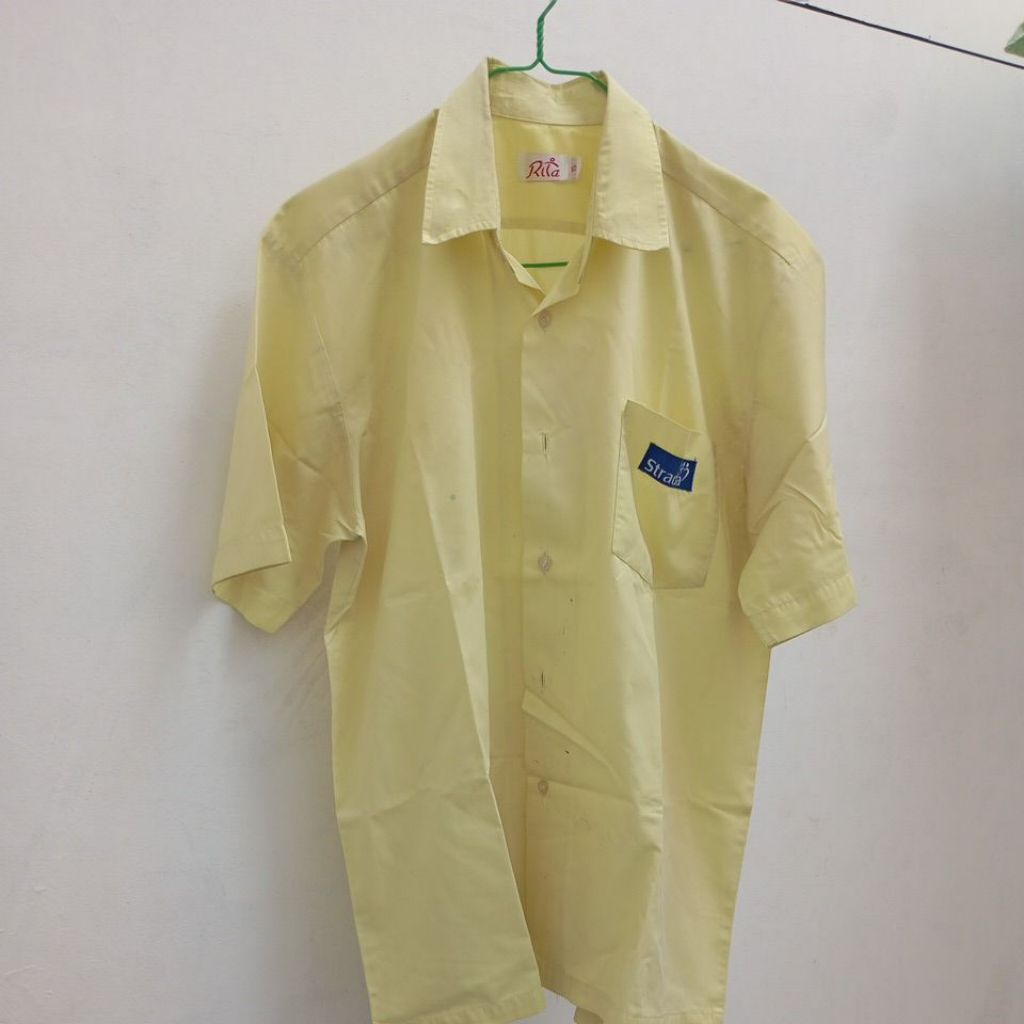 seragam sekolah SMP strada kuning preloved