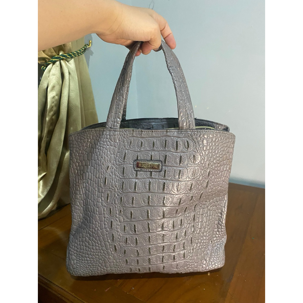 tas pesta kulit buaya