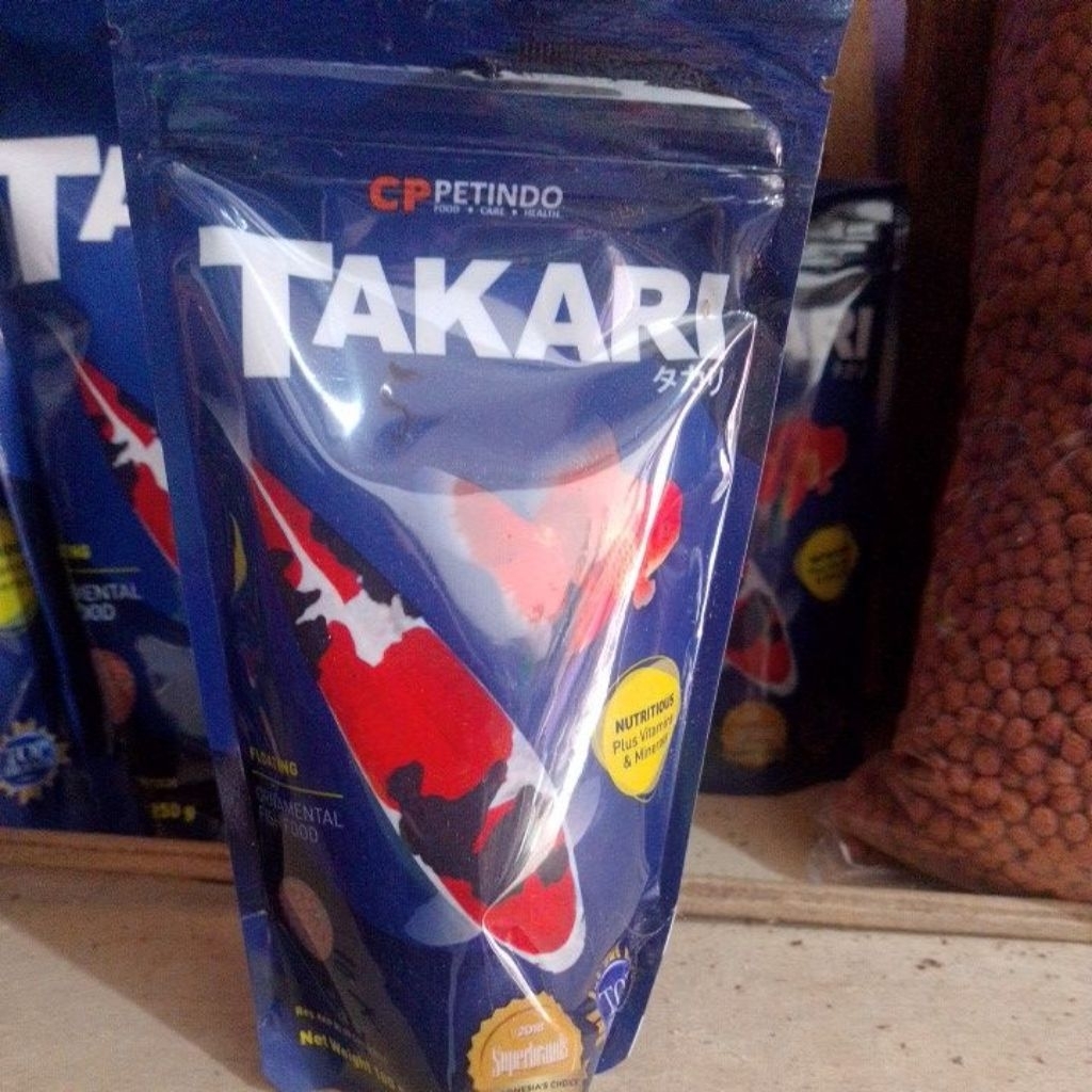 TAKARI MAKAN IKAN
