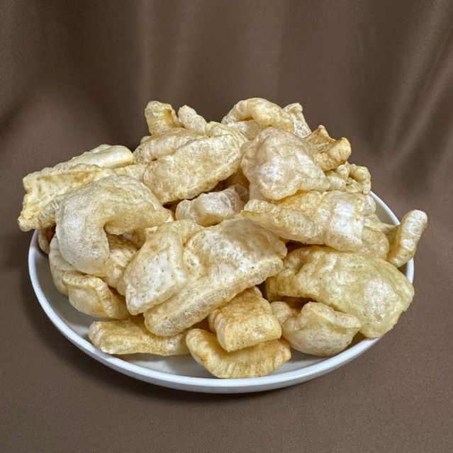 

Kerupuk Babi Kulit / Krupuk Kulit Babi Asli Babi Khas Bali Tanpa Pengawet - Gurih Lezat