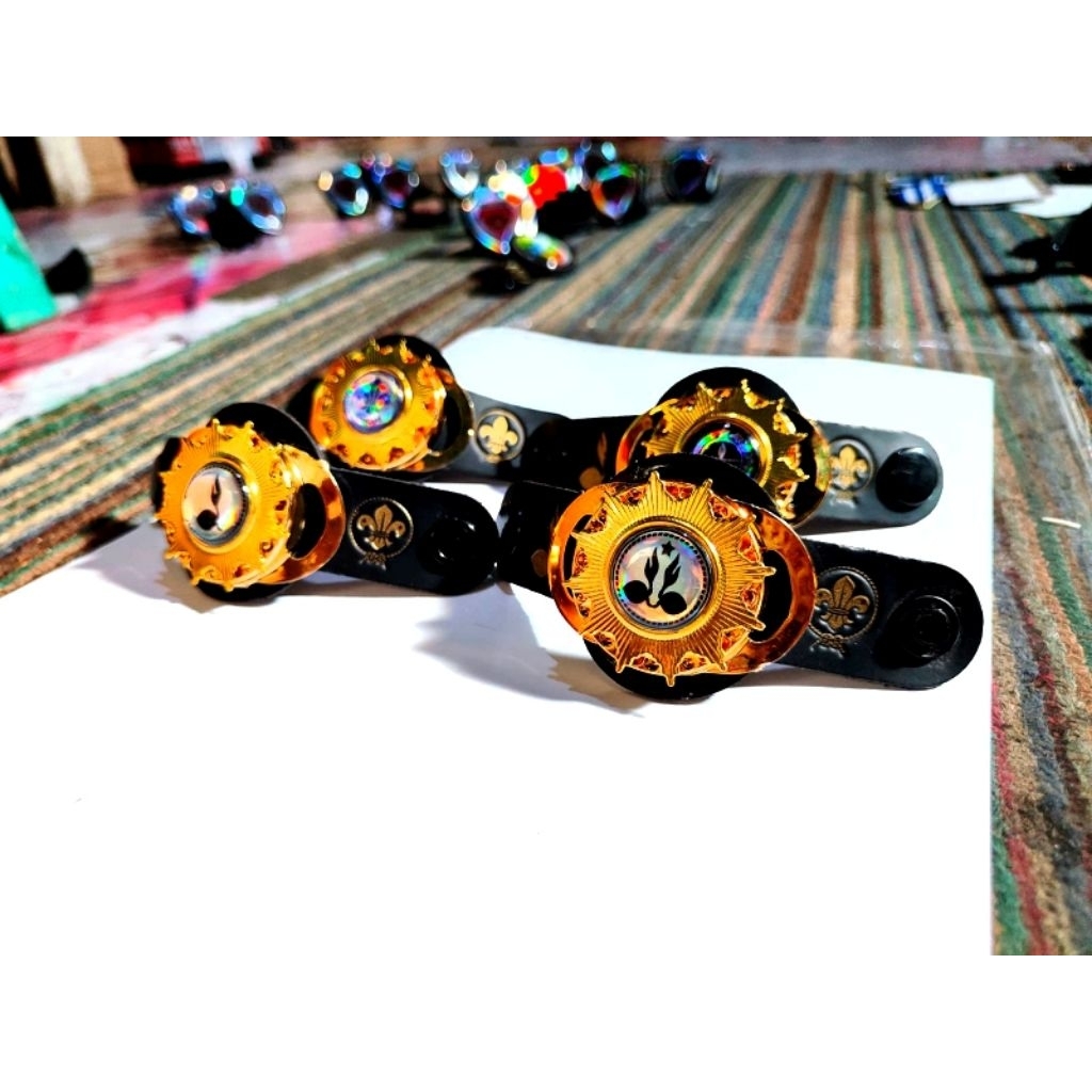 

Ring kacu pramuka kupingan Tumpuk Logam matahari logo hologram bahan premium menarik dan elegan saat dipakai