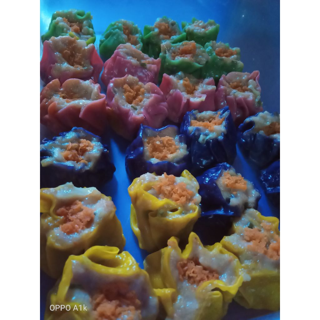 

Dimsum Super isi 12 isi Daging paha Ayam asli,juicy dan kenyal