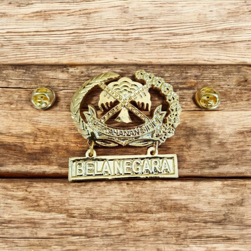 

wings bela negara cor logam pramuka gold