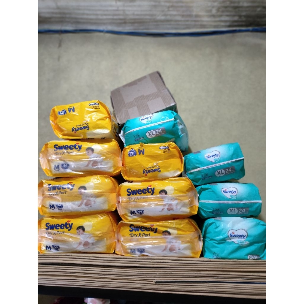 popok bayi pampers sweety ukuran M dan XL