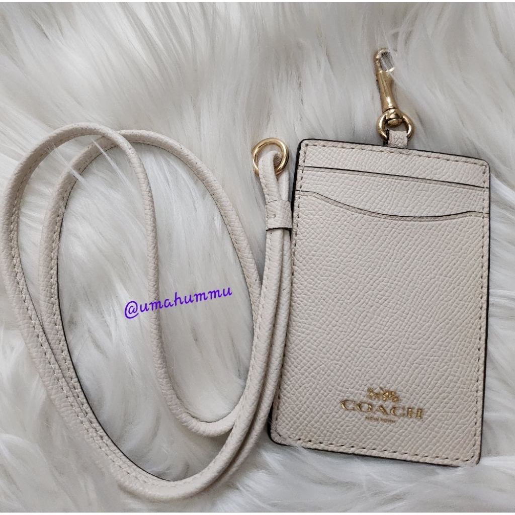 

preloved lanyard putih (chalk) c o a c h