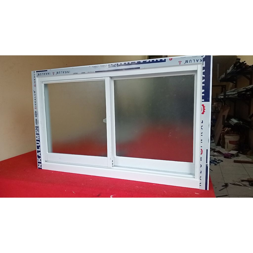 jendela aluminium geser 2 Dau kusen 3" merek inkalum kaca 5mm.