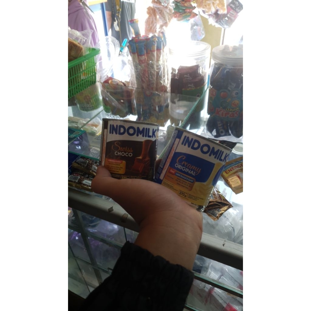 

INDOMILK KENTAL MANIS COKLAT DAN SUSU
