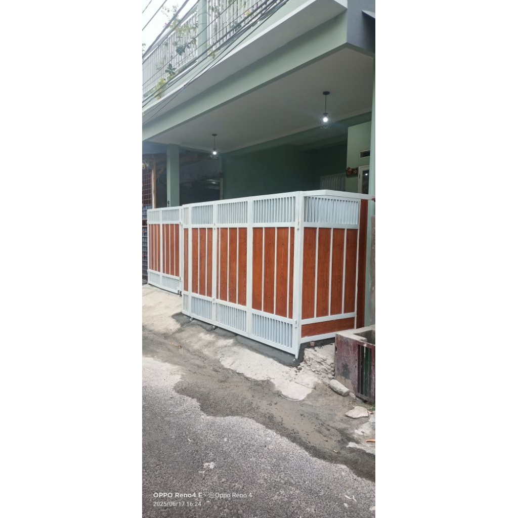 pagar garasi model lipat motif lisplang grc