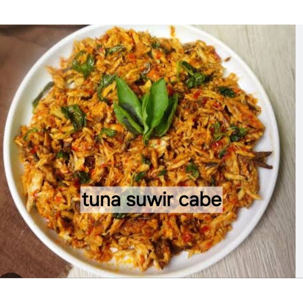 

Ikan tuna suwir cabe 300gr tidak terlalu pedas..anak anak suka (ready H-1l