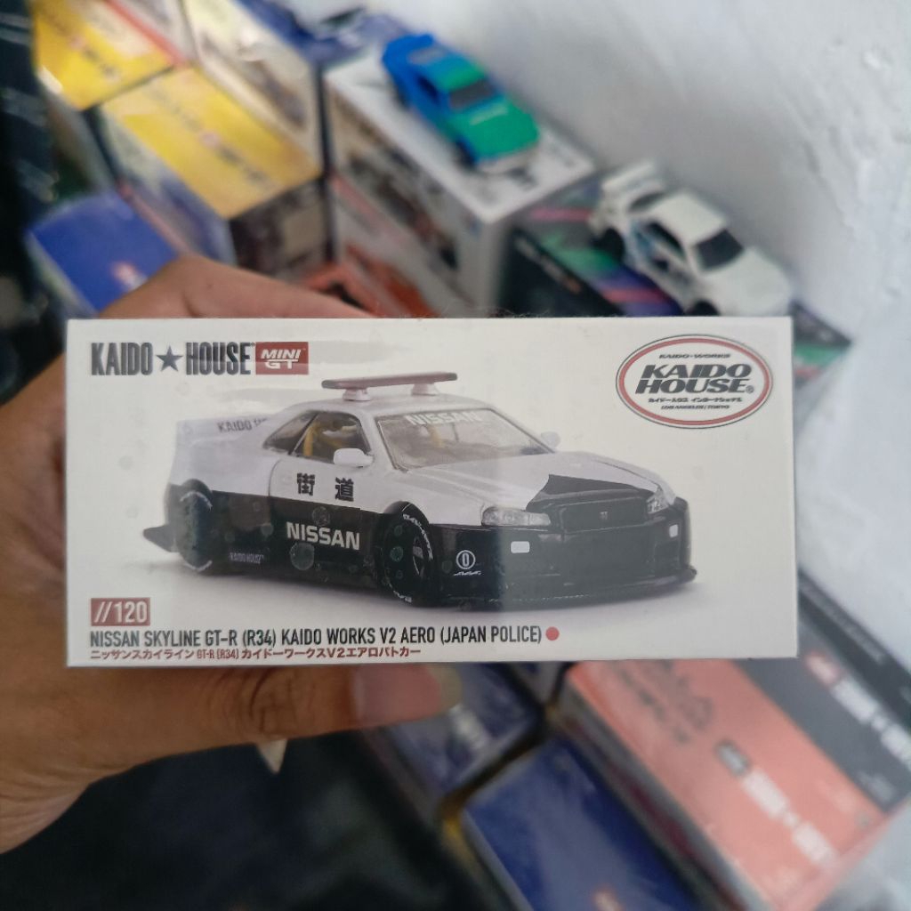 MINI GT KAIDO HOUSE NISSAN SKYLINE R34 POLICE V2 [SEALED]
