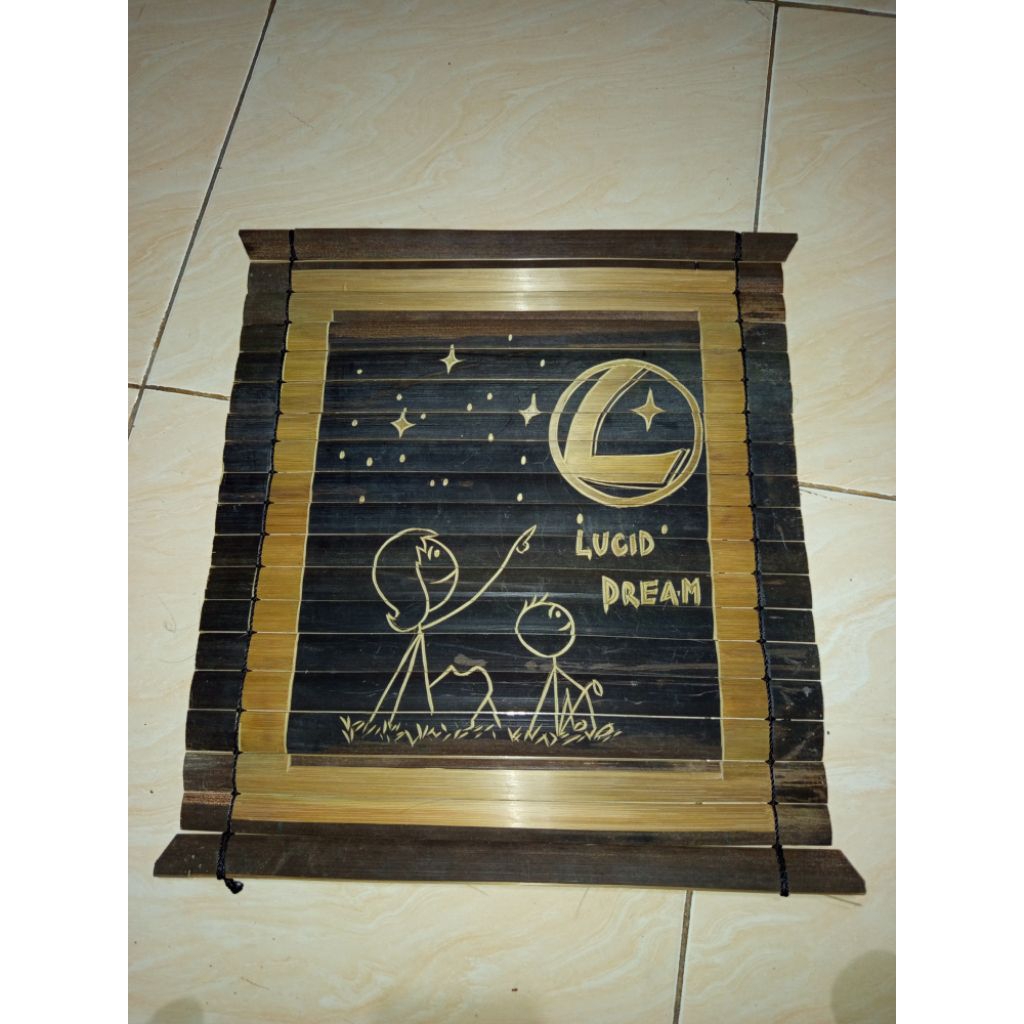 ukiran bambu hitam ori