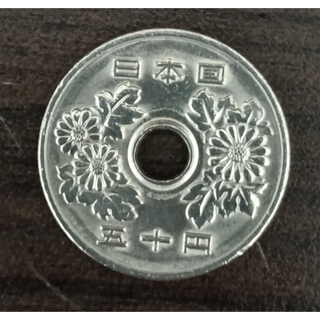 koin Jepang 50 yen tahun campur..