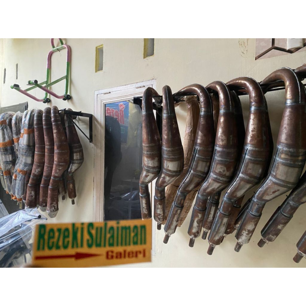 Knalpot kolong plat karat lambung 38