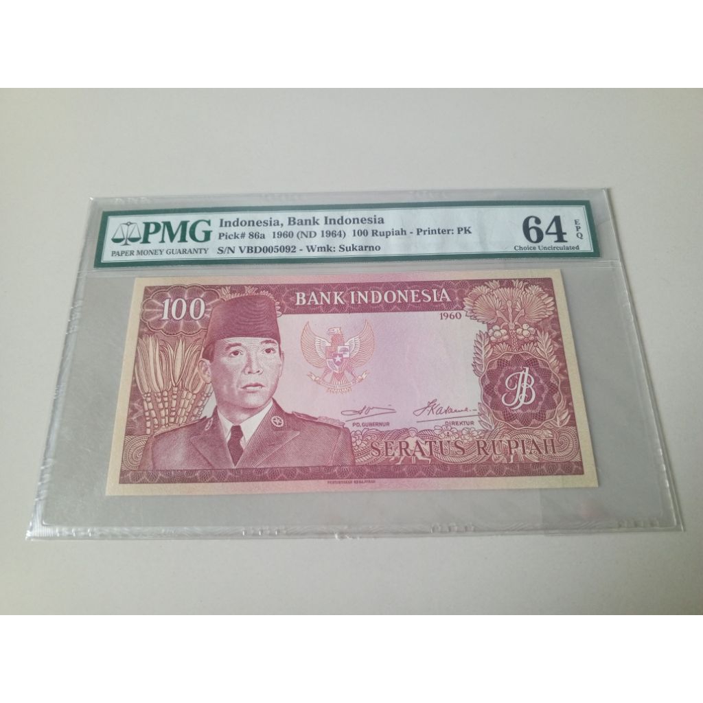 PMG 64 EPQ 100 Rupiah Soekarno thn 1960