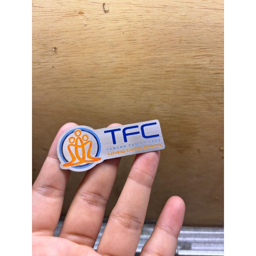 pin tfc custom bahan stainless