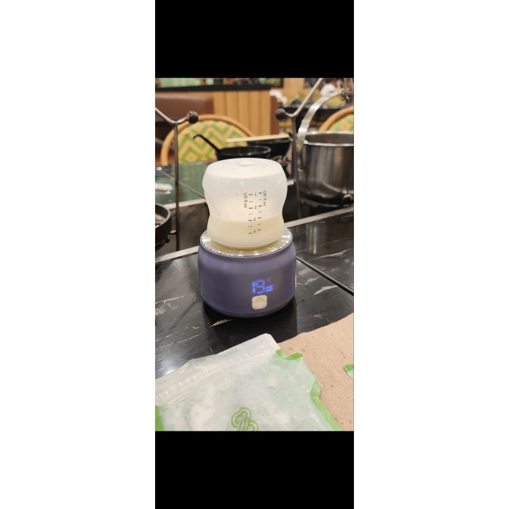 penghangat asi portable