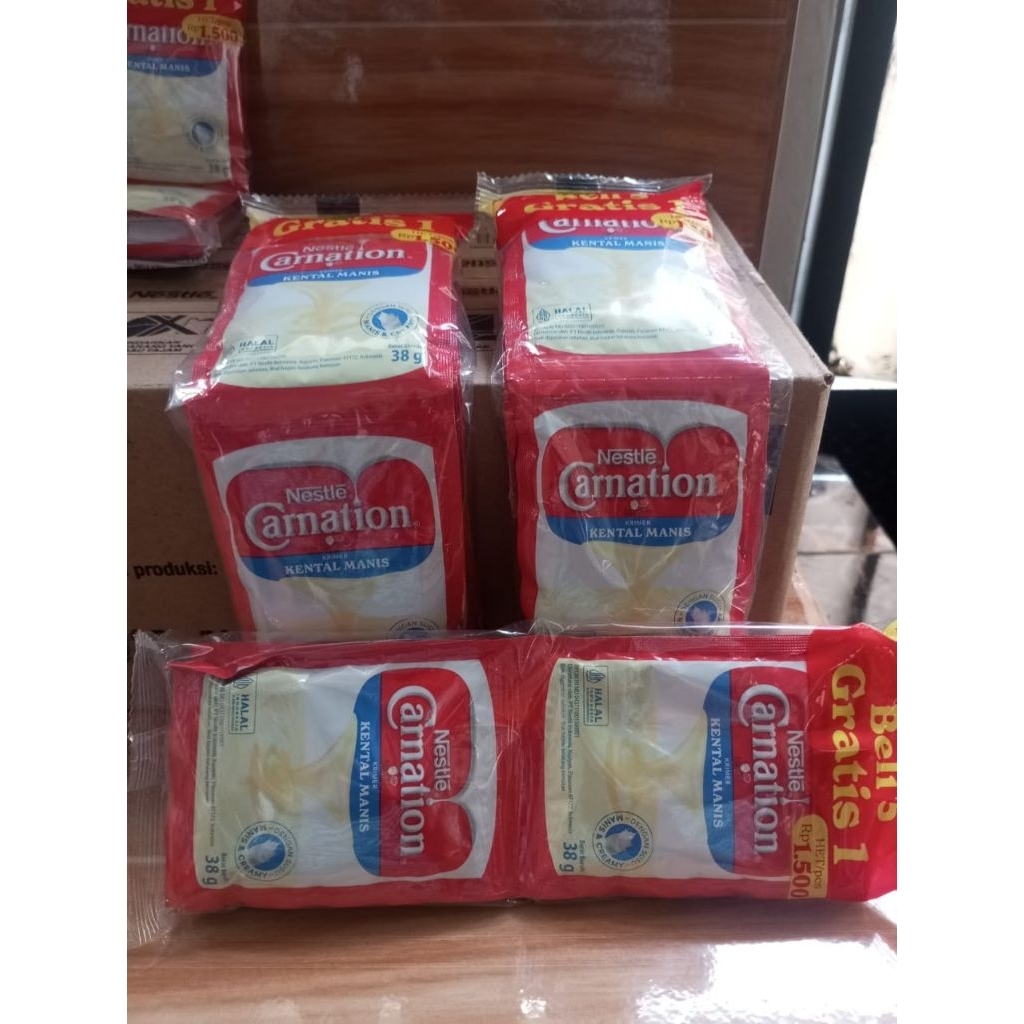 

Nestle Carnation sachet 1 karton isi 20 renceng - susu kental manis saset