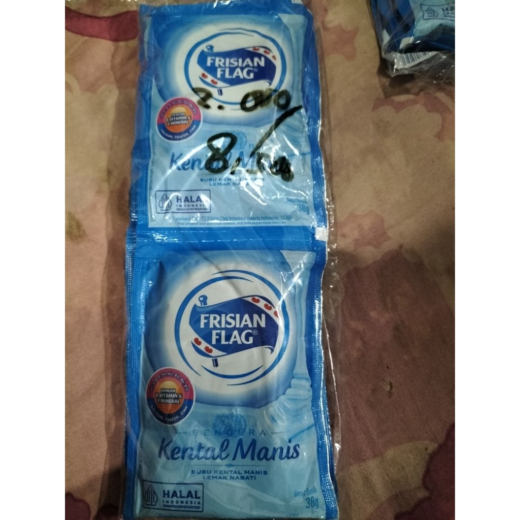 

Frisian Flag Renteng putih dan cokelat