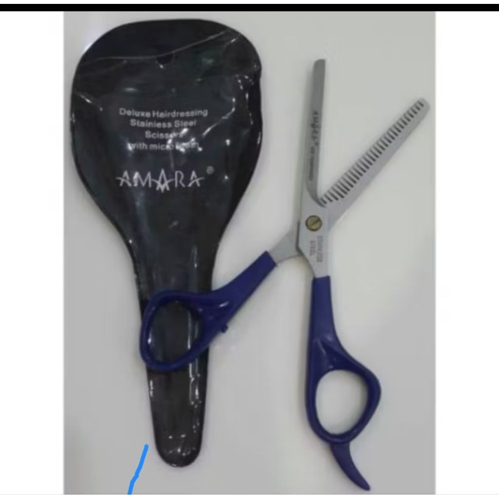 Gunting rambut Sasak Amara