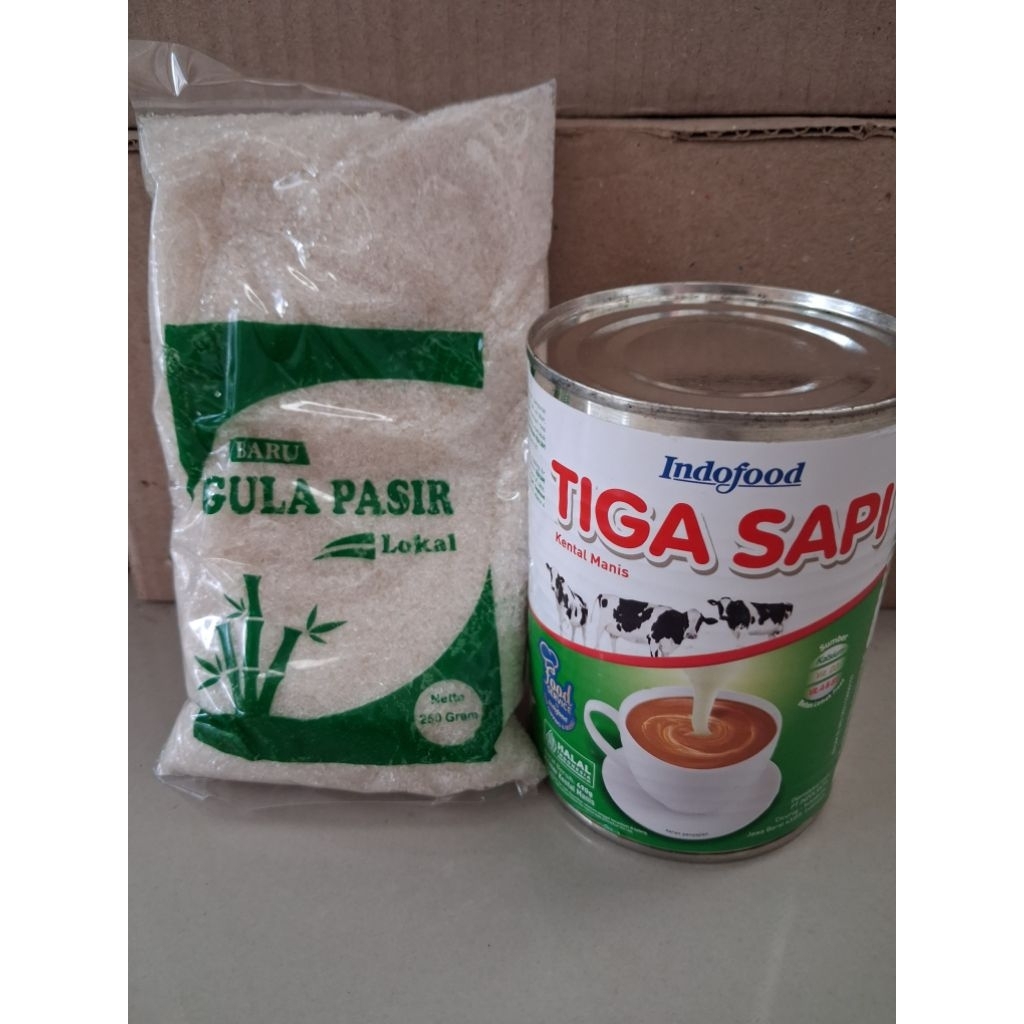 

Susu tiga sapi dan gula pasir 250 gram(PAKET MANIS)