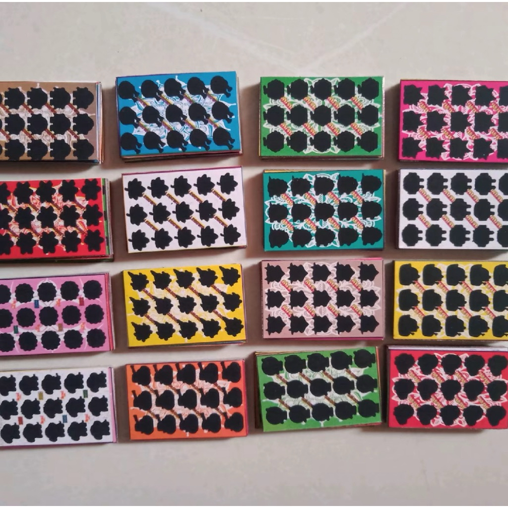 isi 1000 titik 15 gosokan bom tengkorak, sudah tergunting rapih, kertas tebal blok hitam, mainan gos