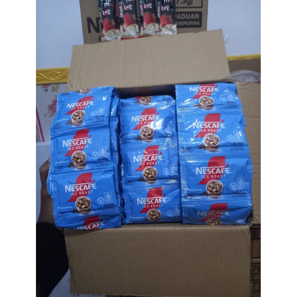 

Nescafe Ice Roast Americano isi 10 sachet x 2 gr - Kopi Instan Berkualitas - Coffee, Robusta, Air, Minuman